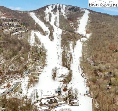 Welcome to your perfect mountain retreat! This cozy studio condo on Sugar Mountain Golf Course in North Carolina - for sale on GolfHomes.com, golf home, golf lot