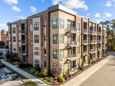 Lakeside living. First level condo conveniently situated on NCSU on Lonnie Poole Golf Course in North Carolina - for sale on GolfHomes.com, golf home, golf lot