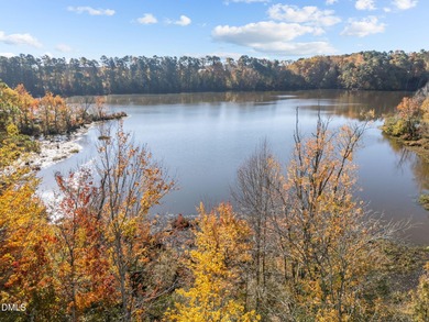 Lakeside living. First level condo conveniently situated on NCSU on Lonnie Poole Golf Course in North Carolina - for sale on GolfHomes.com, golf home, golf lot