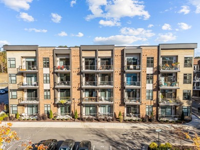 Lakeside living. First level condo conveniently situated on NCSU on Lonnie Poole Golf Course in North Carolina - for sale on GolfHomes.com, golf home, golf lot