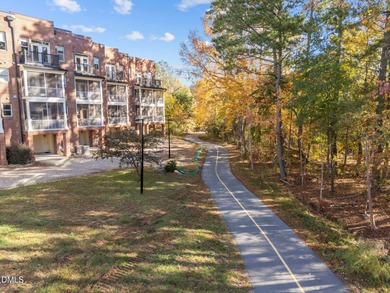 Lakeside living. First level condo conveniently situated on NCSU on Lonnie Poole Golf Course in North Carolina - for sale on GolfHomes.com, golf home, golf lot