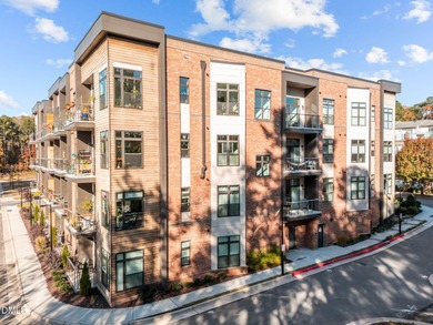 Lakeside living. First level condo conveniently situated on NCSU on Lonnie Poole Golf Course in North Carolina - for sale on GolfHomes.com, golf home, golf lot