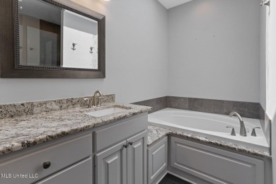 This beautifully maintained 3 bedroom, 2 bath home offers golf on Colonial Country Club Deerfield in Mississippi - for sale on GolfHomes.com, golf home, golf lot