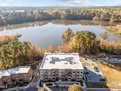 Lakeside living. First level condo conveniently situated on NCSU on Lonnie Poole Golf Course in North Carolina - for sale on GolfHomes.com, golf home, golf lot