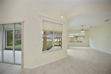 PANORAMIC LAKE VIEWS within the 24/7 secure gated and on Riverwood Golf Club in Florida - for sale on GolfHomes.com, golf home, golf lot