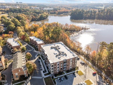 Lakeside living. First level condo conveniently situated on NCSU on Lonnie Poole Golf Course in North Carolina - for sale on GolfHomes.com, golf home, golf lot