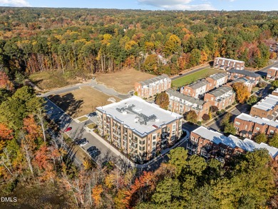 Lakeside living. First level condo conveniently situated on NCSU on Lonnie Poole Golf Course in North Carolina - for sale on GolfHomes.com, golf home, golf lot