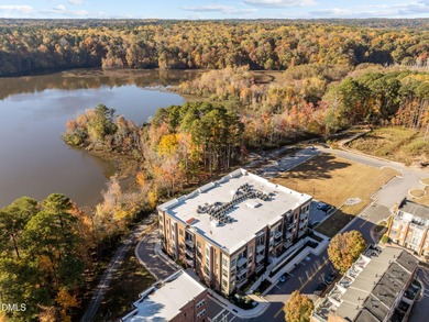Lakeside living. First level condo conveniently situated on NCSU on Lonnie Poole Golf Course in North Carolina - for sale on GolfHomes.com, golf home, golf lot