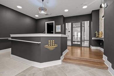 Lakeside living. First level condo conveniently situated on NCSU on Lonnie Poole Golf Course in North Carolina - for sale on GolfHomes.com, golf home, golf lot