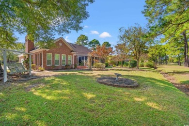 This beautifully furnished ranch-style home is nestled at the on Burning Ridge Golf Course in South Carolina - for sale on GolfHomes.com, golf home, golf lot