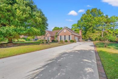 This beautifully furnished ranch-style home is nestled at the on Burning Ridge Golf Course in South Carolina - for sale on GolfHomes.com, golf home, golf lot