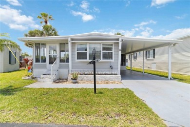 Step into the epitome of coastal charm and comfort with this on Twin Isles Country Club in Florida - for sale on GolfHomes.com, golf home, golf lot