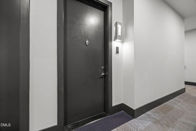 Lakeside living. First level condo conveniently situated on NCSU on Lonnie Poole Golf Course in North Carolina - for sale on GolfHomes.com, golf home, golf lot