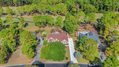 This beautifully furnished ranch-style home is nestled at the on Burning Ridge Golf Course in South Carolina - for sale on GolfHomes.com, golf home, golf lot