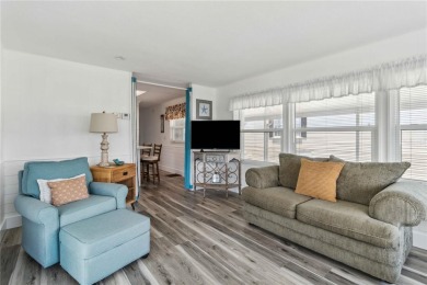 Step into the epitome of coastal charm and comfort with this on Twin Isles Country Club in Florida - for sale on GolfHomes.com, golf home, golf lot