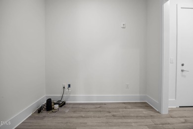 Lakeside living. First level condo conveniently situated on NCSU on Lonnie Poole Golf Course in North Carolina - for sale on GolfHomes.com, golf home, golf lot