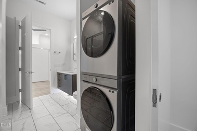 Lakeside living. First level condo conveniently situated on NCSU on Lonnie Poole Golf Course in North Carolina - for sale on GolfHomes.com, golf home, golf lot