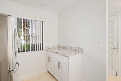 This stunning 2-bedroom, 2-bathroom condo is located on the on Fountains Golf and Country Club in Florida - for sale on GolfHomes.com, golf home, golf lot