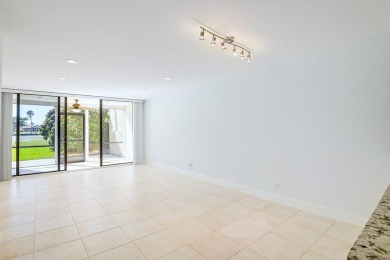 This stunning 2-bedroom, 2-bathroom condo is located on the on Fountains Golf and Country Club in Florida - for sale on GolfHomes.com, golf home, golf lot