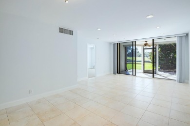 This stunning 2-bedroom, 2-bathroom condo is located on the on Fountains Golf and Country Club in Florida - for sale on GolfHomes.com, golf home, golf lot