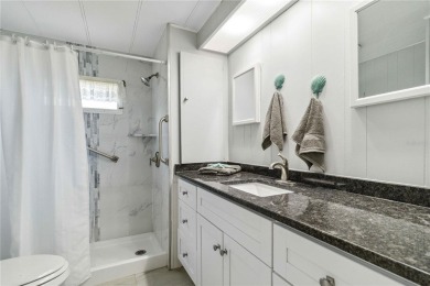 Step into the epitome of coastal charm and comfort with this on Twin Isles Country Club in Florida - for sale on GolfHomes.com, golf home, golf lot