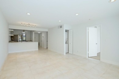 This stunning 2-bedroom, 2-bathroom condo is located on the on Fountains Golf and Country Club in Florida - for sale on GolfHomes.com, golf home, golf lot