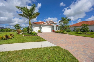 Enjoy refined Florida living in this impeccably maintained on Eagle Lakes Golf Club in Florida - for sale on GolfHomes.com, golf home, golf lot