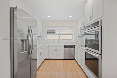 Fully renovated 2-bedroom, 2-bath home plus office/den located on The Club at Emerald Hills in Florida - for sale on GolfHomes.com, golf home, golf lot