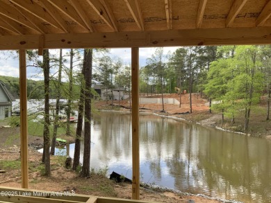 Lowder New Homes newest masterpiece is under construction with 4 on Lake Winds Golf Course in Alabama - for sale on GolfHomes.com, golf home, golf lot