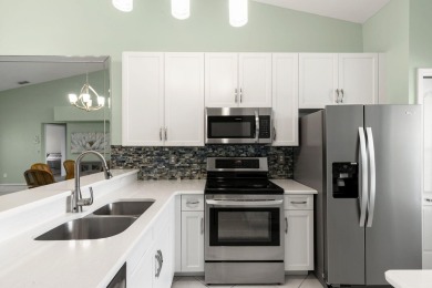 Wake up to the warmth of the southern sun streaming through your on Hammock Bay in Florida - for sale on GolfHomes.com, golf home, golf lot