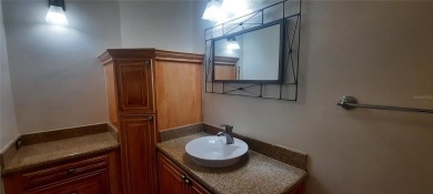 Very nice villa ready to move in as is, or a great clean palette on Lansbrook Golf Club in Florida - for sale on GolfHomes.com, golf home, golf lot