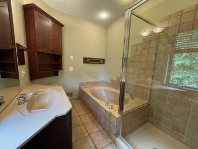 Spacious & comfortable Loon Lake golf course ranch with main on The Loon Golf Resort in Michigan - for sale on GolfHomes.com, golf home, golf lot