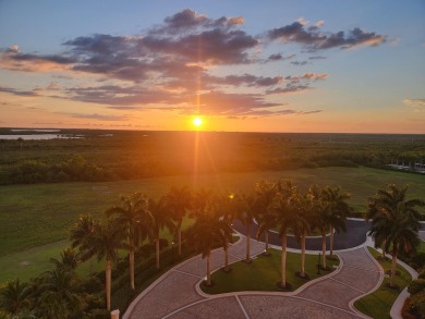 Experience refined coastal living in this elegant residence at on Hammock Bay in Florida - for sale on GolfHomes.com, golf home, golf lot