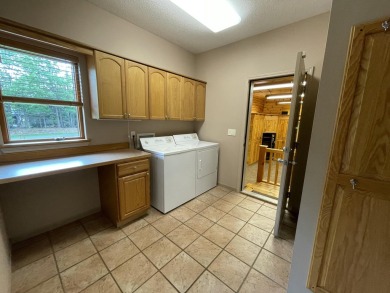 Spacious & comfortable Loon Lake golf course ranch with main on The Loon Golf Resort in Michigan - for sale on GolfHomes.com, golf home, golf lot