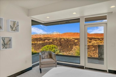 This Entrada home has breathtaking 180-degree views of red rock on Entrada at Snow Canyon in Utah - for sale on GolfHomes.com, golf home, golf lot