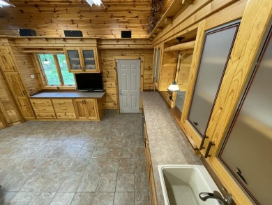 Spacious & comfortable Loon Lake golf course ranch with main on The Loon Golf Resort in Michigan - for sale on GolfHomes.com, golf home, golf lot