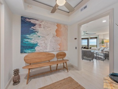 Experience refined coastal living in this elegant residence at on Hammock Bay in Florida - for sale on GolfHomes.com, golf home, golf lot