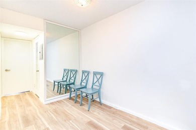 Beautifully remodeled first-floor unit filled with natural light on Hillsboro Pines Golf in Florida - for sale on GolfHomes.com, golf home, golf lot