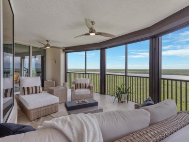 Experience refined coastal living in this elegant residence at on Hammock Bay in Florida - for sale on GolfHomes.com, golf home, golf lot