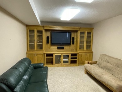 Spacious & comfortable Loon Lake golf course ranch with main on The Loon Golf Resort in Michigan - for sale on GolfHomes.com, golf home, golf lot