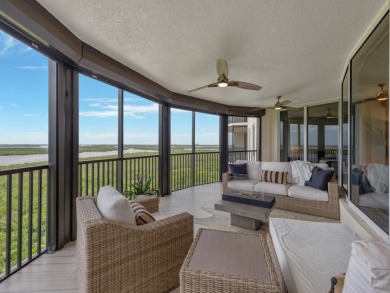 Experience refined coastal living in this elegant residence at on Hammock Bay in Florida - for sale on GolfHomes.com, golf home, golf lot