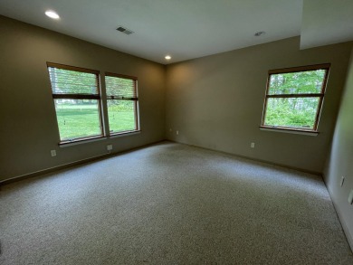 Spacious & comfortable Loon Lake golf course ranch with main on The Loon Golf Resort in Michigan - for sale on GolfHomes.com, golf home, golf lot