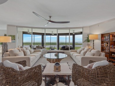 Experience refined coastal living in this elegant residence at on Hammock Bay in Florida - for sale on GolfHomes.com, golf home, golf lot