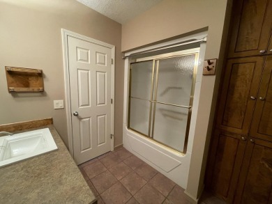 Spacious & comfortable Loon Lake golf course ranch with main on The Loon Golf Resort in Michigan - for sale on GolfHomes.com, golf home, golf lot