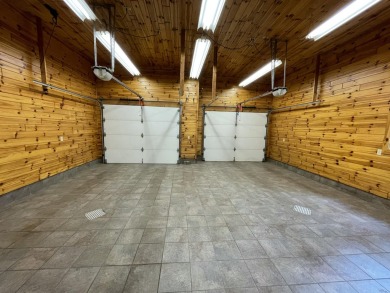 Spacious & comfortable Loon Lake golf course ranch with main on The Loon Golf Resort in Michigan - for sale on GolfHomes.com, golf home, golf lot