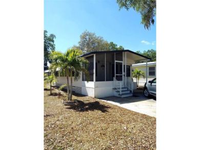 DOUBLE WIDE MOBILE HOME in active 55+ community. FIXER-UPPER IS on River Run Golf Links in Florida - for sale on GolfHomes.com, golf home, golf lot