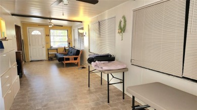 DOUBLE WIDE MOBILE HOME in active 55+ community. FIXER-UPPER IS on River Run Golf Links in Florida - for sale on GolfHomes.com, golf home, golf lot
