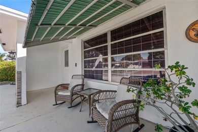 Welcome to this single-family home in Paradise Gardens IV in on Oriole Golf and Tennis Club in Florida - for sale on GolfHomes.com, golf home, golf lot