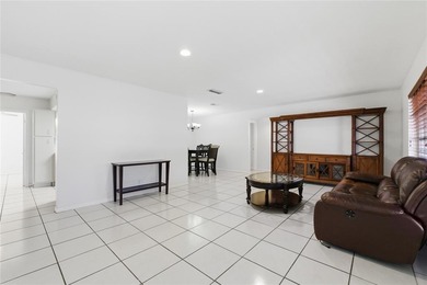 Welcome to this single-family home in Paradise Gardens IV in on Oriole Golf and Tennis Club in Florida - for sale on GolfHomes.com, golf home, golf lot