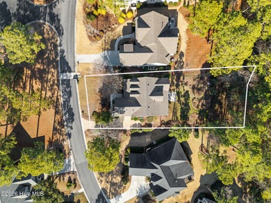 Welcome to 597 Riverwood Dr in Winding River Plantation! This on Carolina National Golf Club in North Carolina - for sale on GolfHomes.com, golf home, golf lot